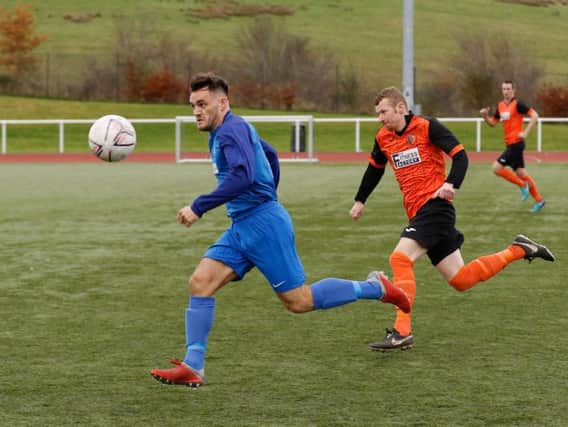 Two-goal Carluke Rovers hero Eddie Haley (left) in action against Irvine Victoria (Pic by Kevin Ramage)