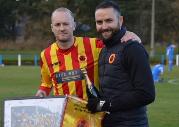Kirk Forbes is congratulated by manager Gordon Moffat on his 100th appearance for Rossvale at Lanark. (pic by permission of HT Photography/@dibsy_)