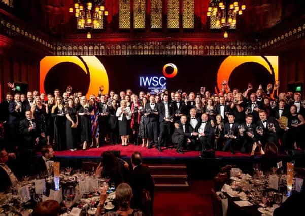 The team from William Grant and Sons show off the dozens of awards and medals they won at the 2018 International Wine & Spirits Competition