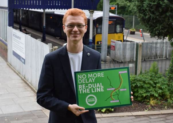Greens MSP Ross Greer launches public petition to dual Milngavie rail line.