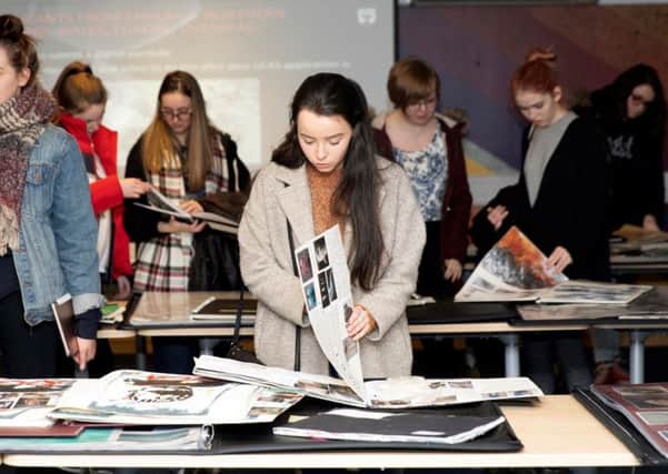 Art students browse portfolios at the event held in New College Lanarkshires Cumbernauld campus in conjunction with Duncan of Jordanstone College of Art & Design