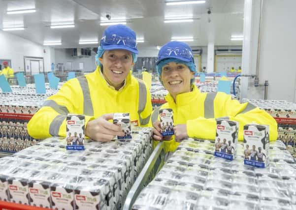 Scottish 400m hurdles  record holder Eilidh Doyle joins MÃ¼ller Milk & Ingredients CEO Patrick MÃ¼ller to mark the completion of the work at the Bellshill dairy which makes the Official Milk and Milk Drinks of British Athletics. 
Pic: Peter Devlin