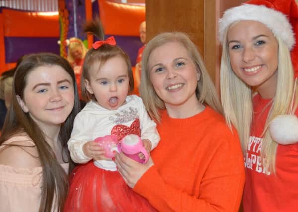 Steph Shilliday and her daughters Abbie (left) and Sophie with Leigh-Ann Johnstone (right) breast feeding support service assistant in the neonatal unit at University Hospital Wishaw.