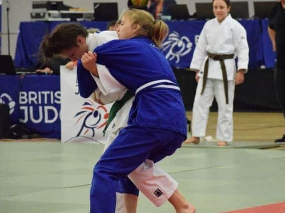 Lily Rafferty (right) shows her grappling skills on way to British judo bronze medal (Submitted pic)