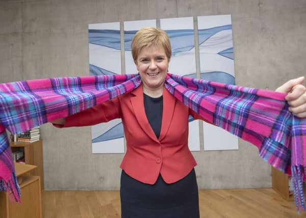 Sporting the exclusive Friends of Cancer Research UK tartan, First Minister Nicola Sturgeon.