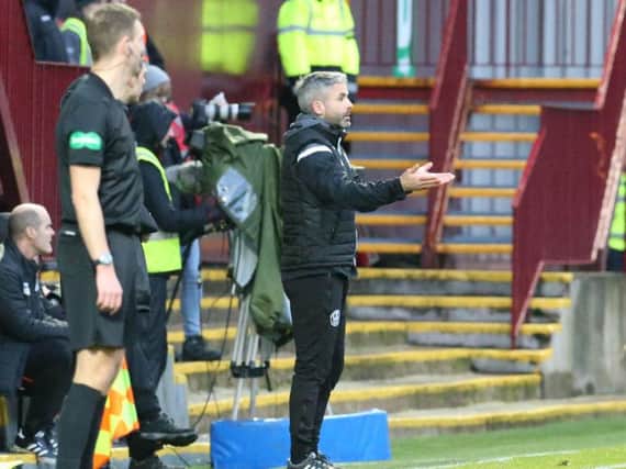 Keith Lasley took charge from the Well dugout due to Stephen Robinsons touchline ban (Pic by Ian McFadyen)