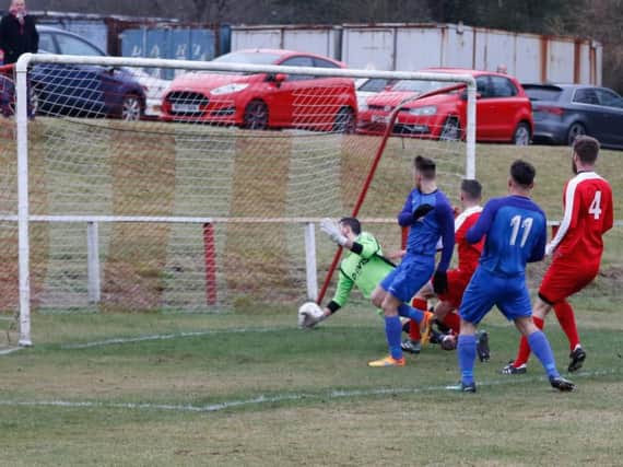 The ball hits the Forth Wanderers net as Ciaran Lafferty opens the scoring for Carluke Rovers on Saturday (Pic by Kevin Ramage)