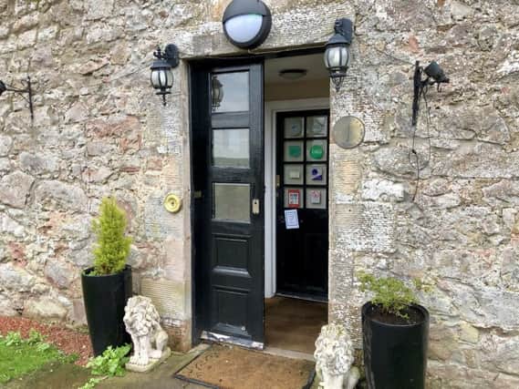 The one open door our reporter found at Shieldhill Castle Hotel behind which lay bundles of unopened mail.