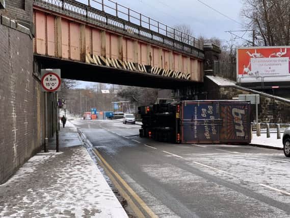 The lorry overturned between Motherwell and Craigneuk under the railway bridge