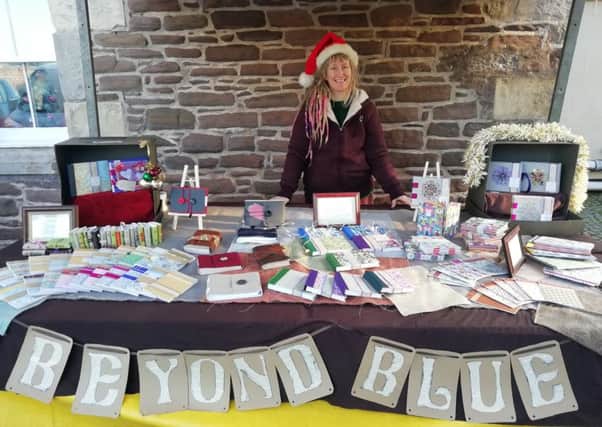 Meeting like-minded people...Beth Lancaster set up stall at the Lanark Christmas market where great interest was shown in her home-made notebooks.