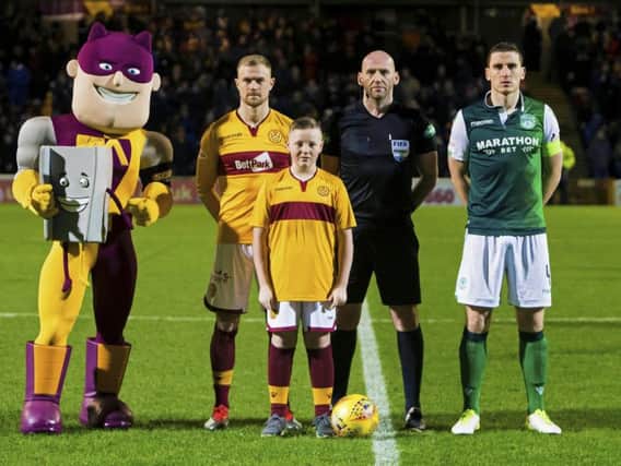 Nathan Pearce is pictured pre-match with key figures including Wells Richard Tait (Pic courtesy of Motherwell FC)