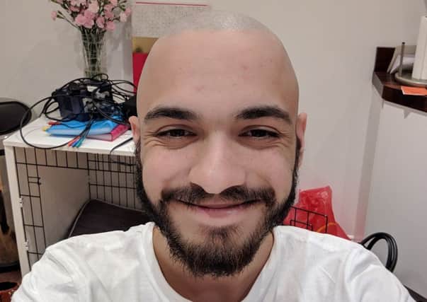Hal Dhami is all smiles after his fundraising head shave