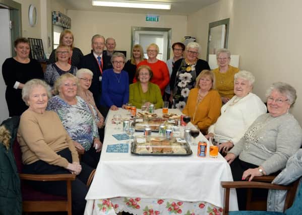 Staff and residents of Woodlands Grove in Viewpark are joined by Councillor Bob Burrows and Provost Jean Jones, who officially opened the new common room
