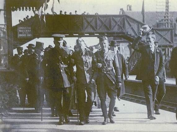 A badly wounded Carluke hero, William Angus VC, is welcomed home during World War 1