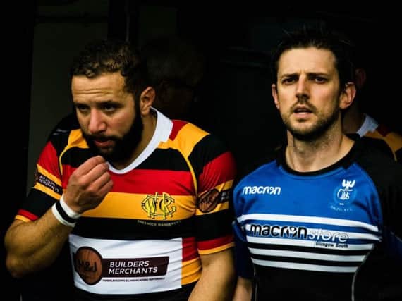 Calder (right) leads Dalziel out in Decembers Shield final loss to Greenock