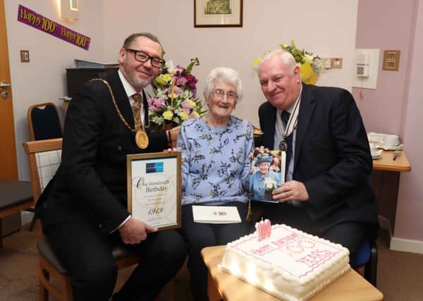 Helen Bruce is joined by South Lanarkshire provost Ian McAllan and Deputy Lieutenant of Lanarkshire Terence Currie as she celebrates her 100th birthday