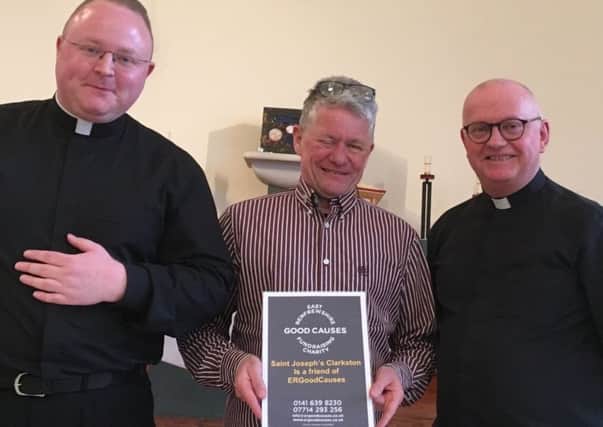 Pictured from left: Father Jonathon, Russell Macmillan, Father Stephen from Saint Joseph's church in Clarkston