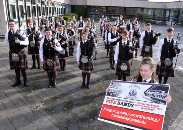 Mollie Jeffrey (front) helps launch the North Lanarkshire Schools Pipe Bands crowdfunding campaign as it looks to reach a final total of £80,000 for equipment and travel costs