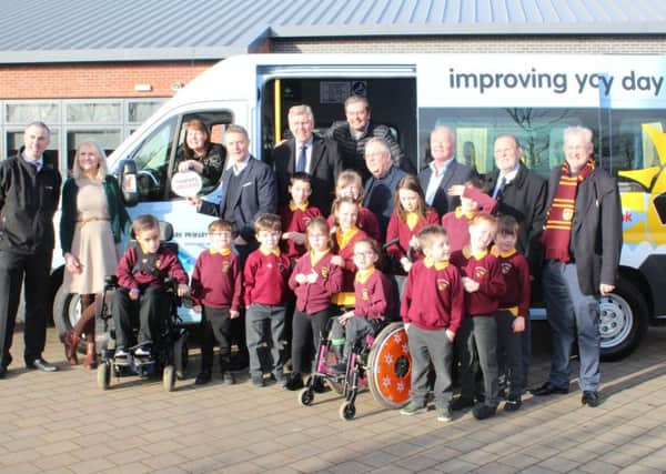 Firpark Primary takes delivery of its new Variety Sunshine Coach which replaces its old 11-year-old minibus which was no longer reliable