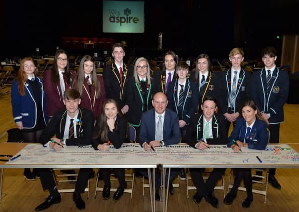 Pupils signed a banner as part of their commitment to the six conference themes