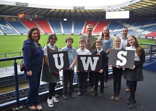 Mount Florida  pupils with Professor Fiona Henriquez from UWS, Colin Lobban from Hampden Park Limited, Dr Stephanie Valentin from UWS and UWS Dr Chris Easton.
