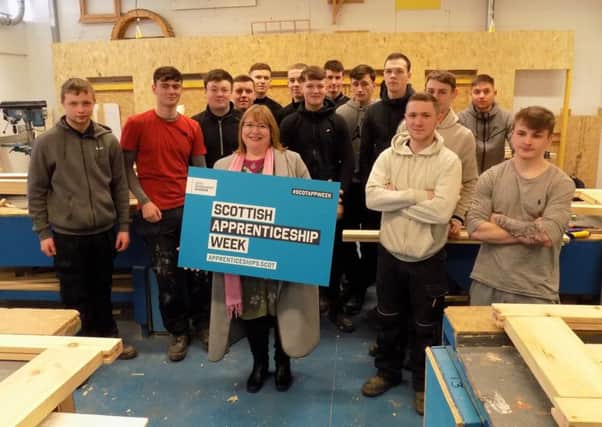 Motherwell and Wishaw MSP Clare Adamson meets joinery modern apprentices at New College Lanarkshire