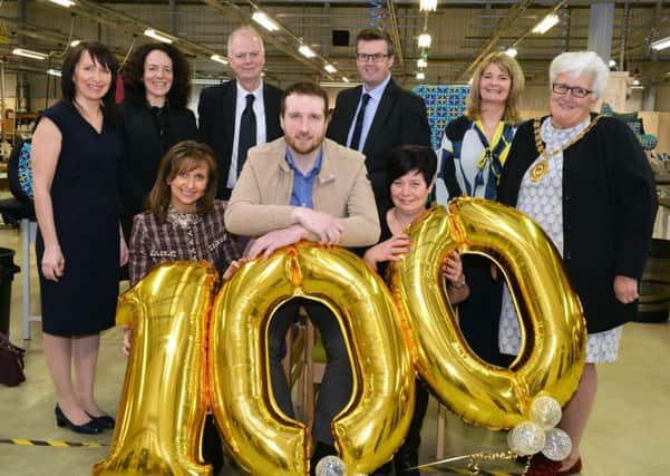 Celebrating 100 new jobs for the Supported Enterprise Service are: back row (l to r) Gail McKee (Supported Employment coordinator); Yvonne Weir (NLC Enterprise manager); Cumbernauld South councillor Allan Graham (Enterprise and Growth convener); Des Murray (NLC chief executive); Donella Duff (Supported Enterprise manager); and Kilsyth councillor Jean Jones (North Lanarkshire provost). Front row (l to r) Jeanette McIntyre (Indeglas managing director); Stephen Robb (Indeglas employee); and Mags Quinn (job coach)