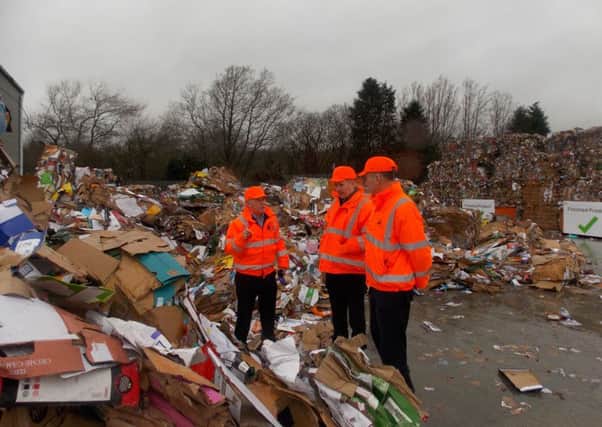 Stuart McDonald MP reviewing recyclable material at the DH Smith depot in Kilsyth