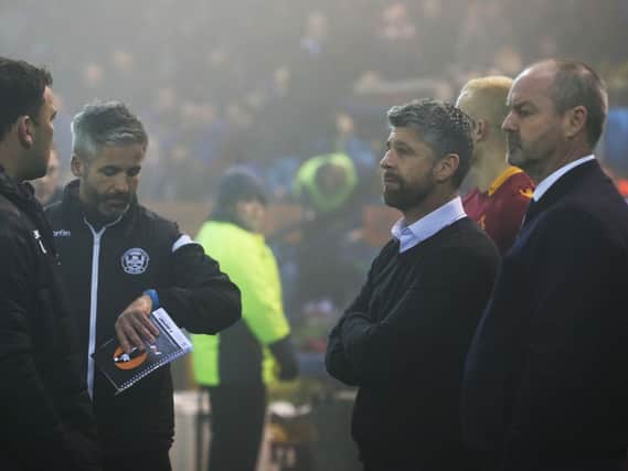 Management teams from both sides in the mist on Wednesday night (Pic by Ian McFadyen)