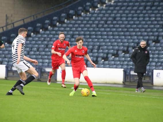 Danny Lennon watches as Scott Banks takes on the Queen's Park defence at Hampden last week (pic by Craig Black Photography)