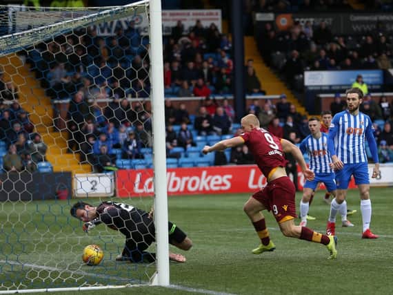 Killie keeper Daniel Bachmann almost fumbles Richard Tait's overhead kick into his own net in the first half (Pic by Ian McFadyen)