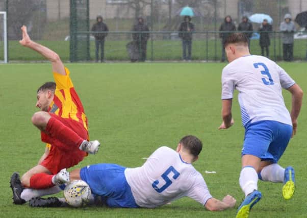 Benburb got the win over Rossvale in difficult conditions at Huntershill (pic by HT Photography/@dibsy_)