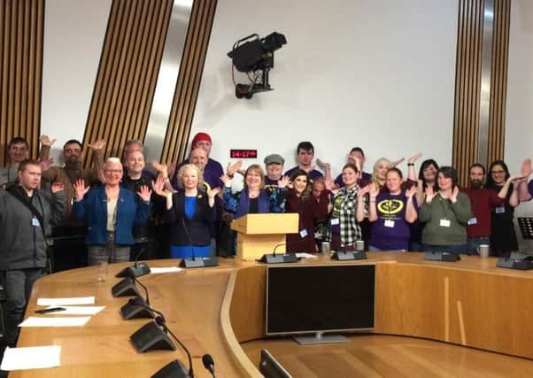 Members of Fool On Support are pictured at Holyrood with MSPs Clare Adamson and Claire Baker and Councillor Agnes Magowan