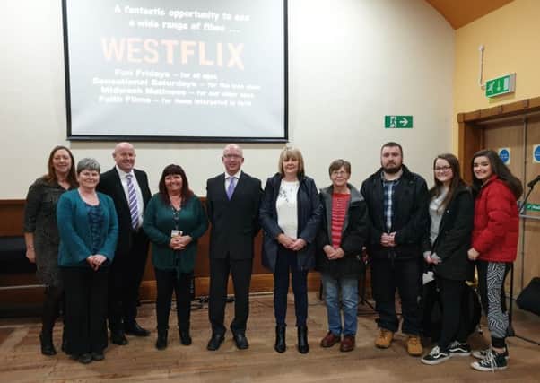 The Rev Calum Stark (centre, left) was delighted to launch 'Westflix' at Bellshill West Parish Church