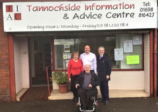 Tannochside Information and Advice Centre staff and management committee members with Thorniewood councillor Bob Burrows