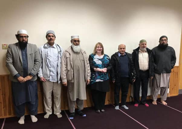 Motherwell and Wishaw MSP Clare Adamson is pictured with Senior Imam Abdur Rehman Mehdi, Imam Asif Yaqoob, members of the committee and community representatives at Wishaw Central Mosque and Education Centre in Craigneuk