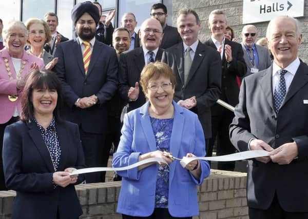 Council officials pictured in 2017 as they opened the Kirkintilloch Community Hub building, which will now operate under reduced hours. Photo Emma Mitchell.