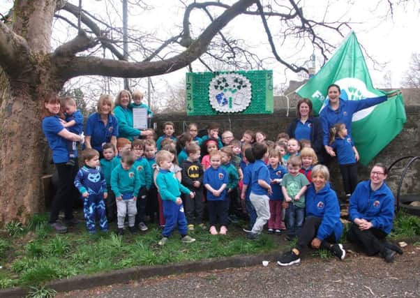 St Marys Nursery kids with their sixth eco flag
