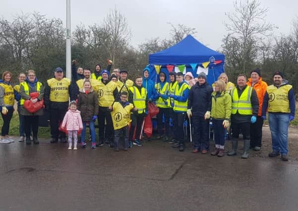 Carluke's Burn Road residents association on Spring Clean with Milton Rovers.