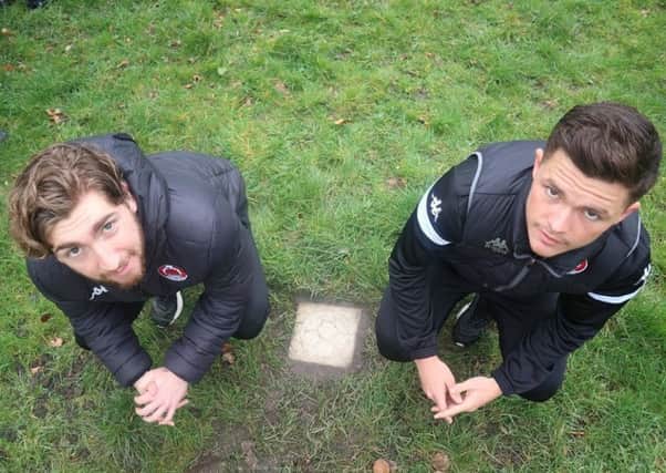 Clyde FC footballers Ray Grant (left) and Chris McStay with one of the stepping stones