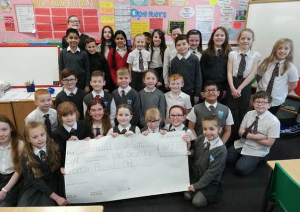 Class 5b from Cumbernauld Primary with their donation