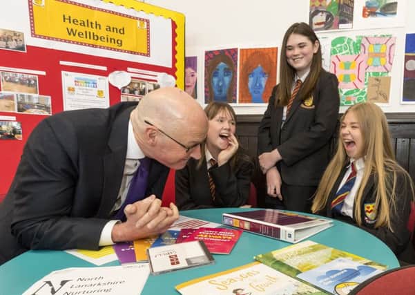 John Swinney shares a joke with pupils at Bellshill Academy during last weeks visit