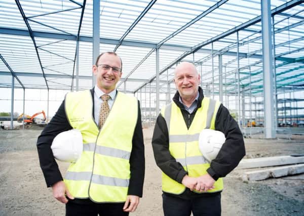 Willie Scanlon (left), property development manager of Farmfoods, and  Richard Bowden, special projects director at ISD Solutions at a major new distribution centre next to the Farmfoods HQ in Cumbernauld.