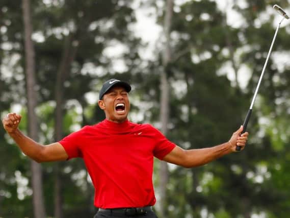 Tiger Woods roar after winning his fifth Masters title (Kevin C. Cox/Getty)