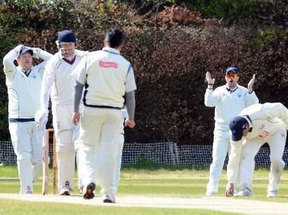 Uddingston Cricket Club wicket keeper and captain Bryan Clarke (first left) is eyeing a high league finish this season