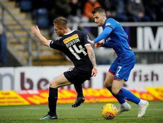 Liam Polworth (right) in action in a Scottish Championship match against Falkirk back in January (Pic by Michael Gillen)
