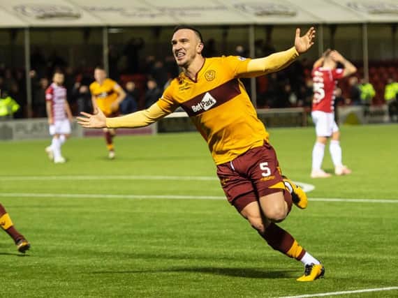 Tom Aldred celebrates scoring one of his two goals in the 2-1 win on Motherwell's last visit to the Hope CBD Stadium in December.