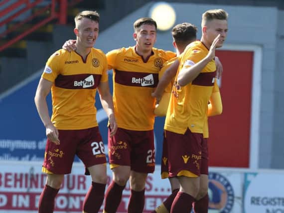 The celebrations after David Turnbull (1st left) had put Motherwell ahead at Hamilton Accies (Pic by Ian McFadyen)