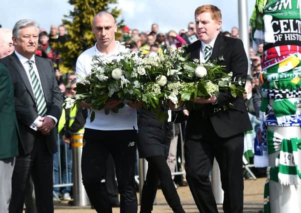 Neil Lennon and Scott Brown led the Celtic tribute to Billy McNeill on Saturday morning by laying a wreath in his honour at his statue outside Parkhead