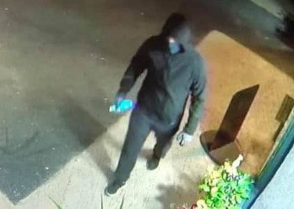 Bothwell restaurant San Vincenzo published CCTV images of a hooded suspect seen holding spray paint on its Facebook page